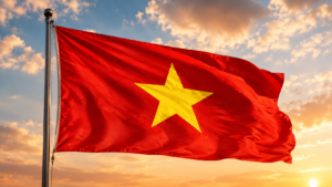 De Vietnamese vlag wappert aan een vlaggenmast tegen een zonsondergang